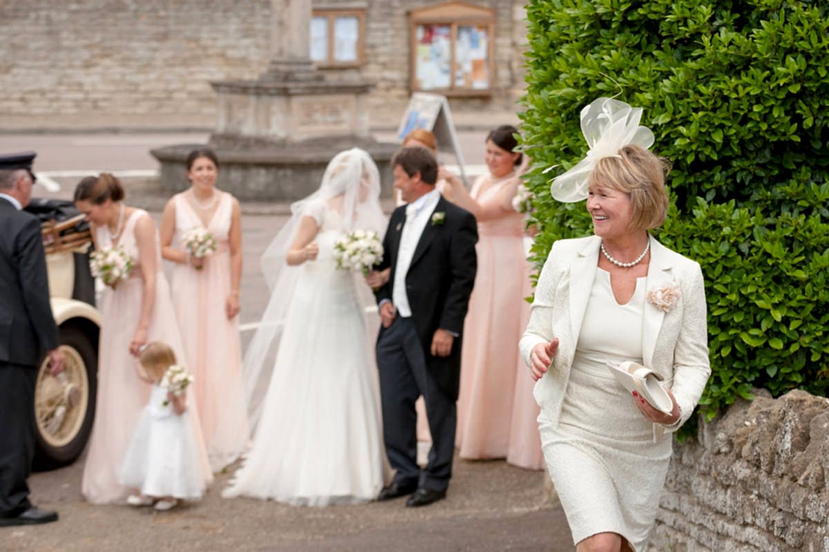 Mother of the bride arriving at Polebrook church
