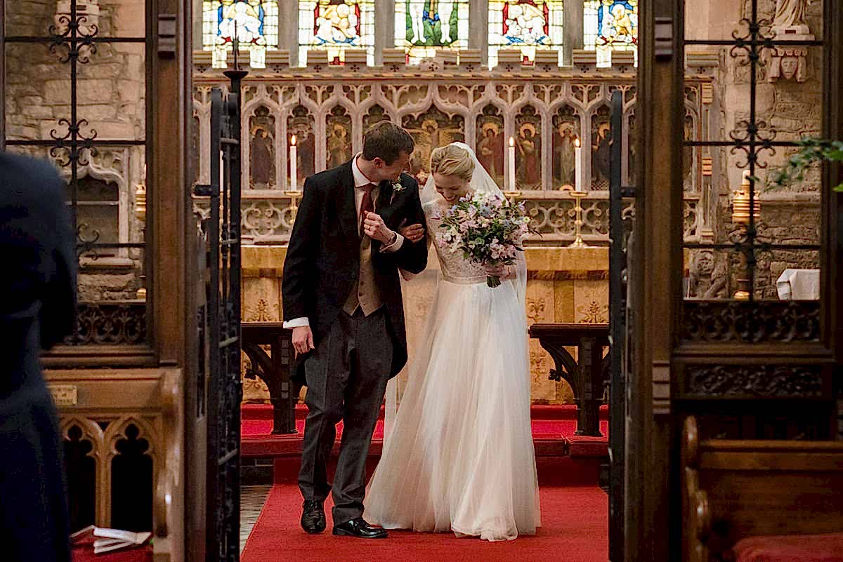 Wedding recessional at St Mary's church in Geddington, Northants