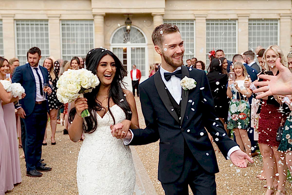 Throwing confetti at Rushton Hall