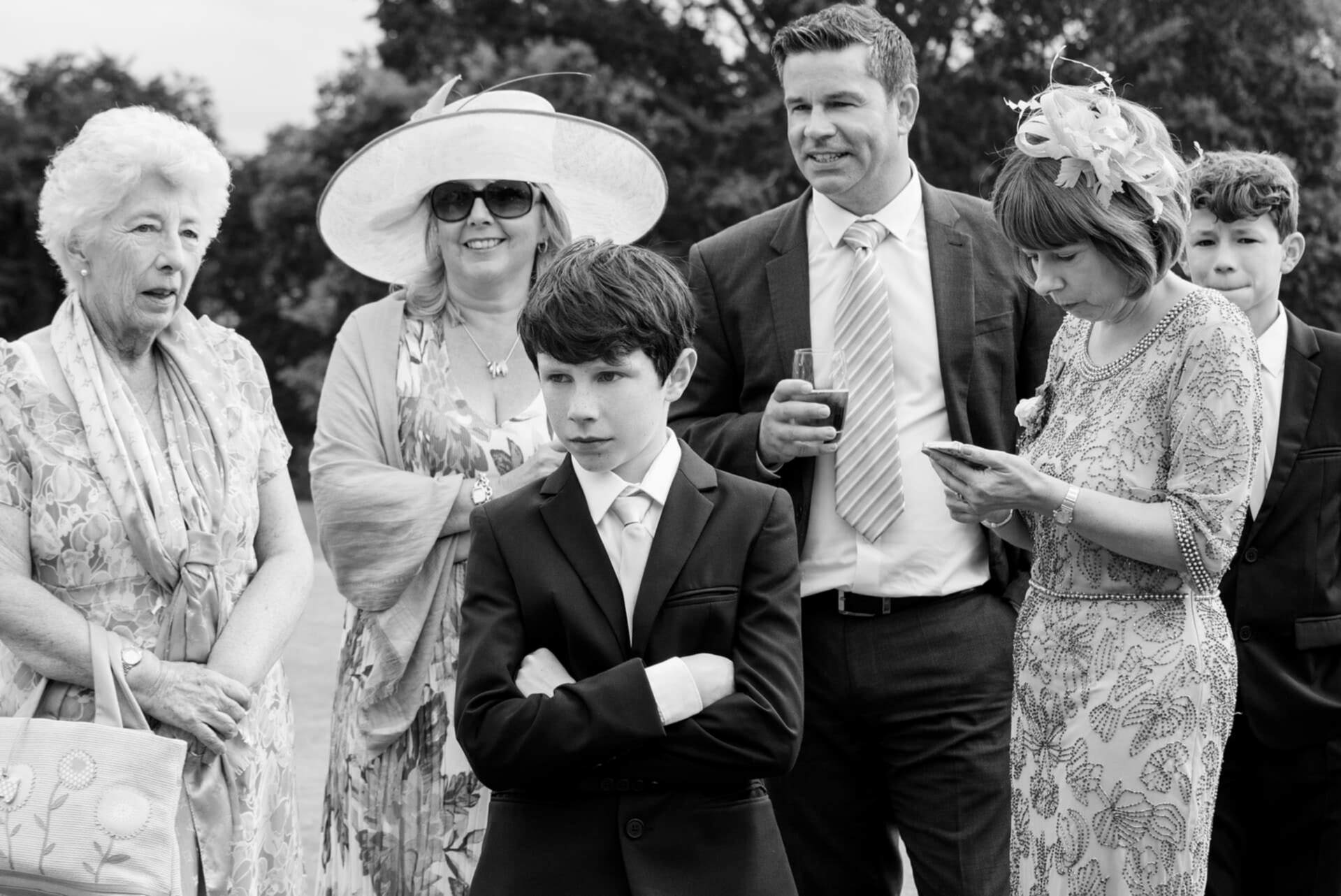 Child looking bored at a wedding