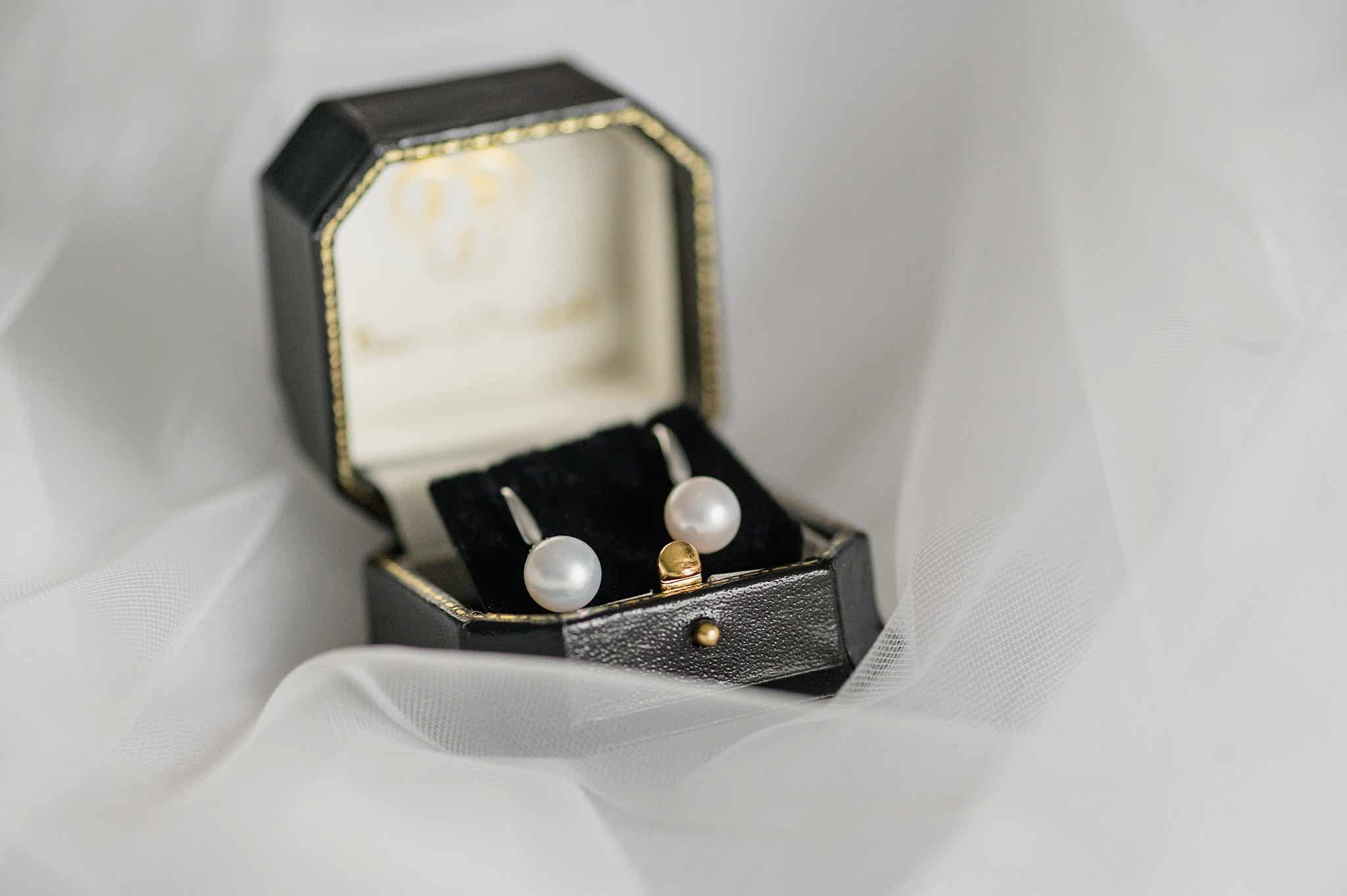 Pearl earrings in a vintage style jewellery box