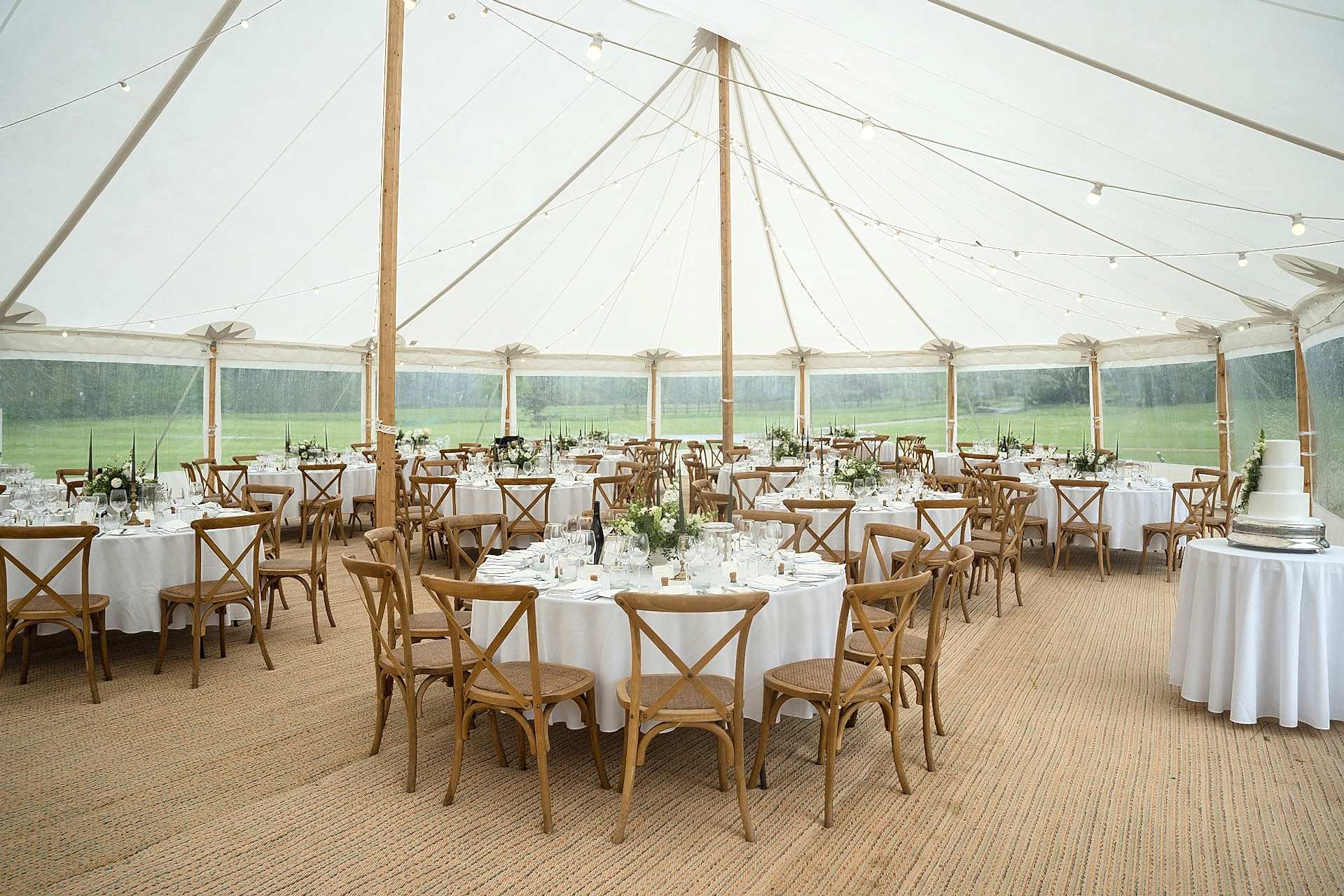 A sailcloth marquee set for the wedding breakfast