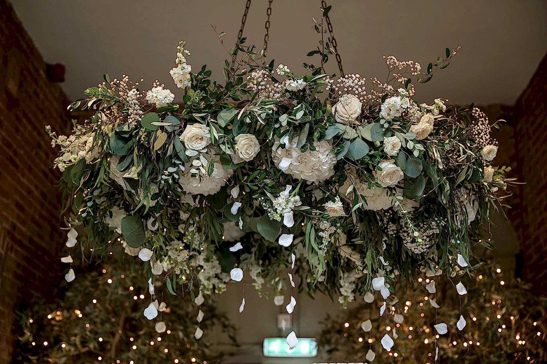 A hanging floral hoop for a wedding at Fawsley Hall