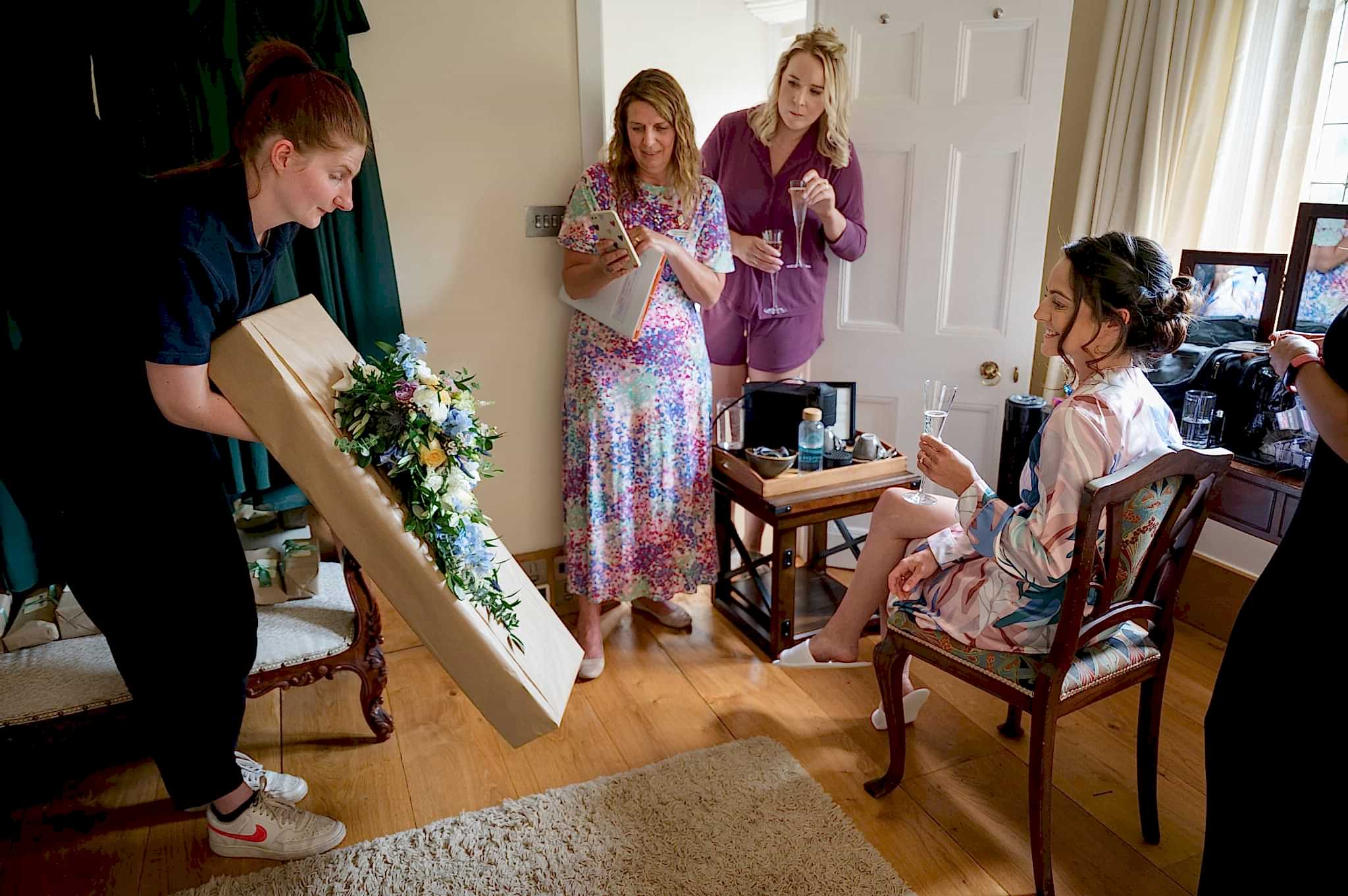 The florist showing the bride her bouquet