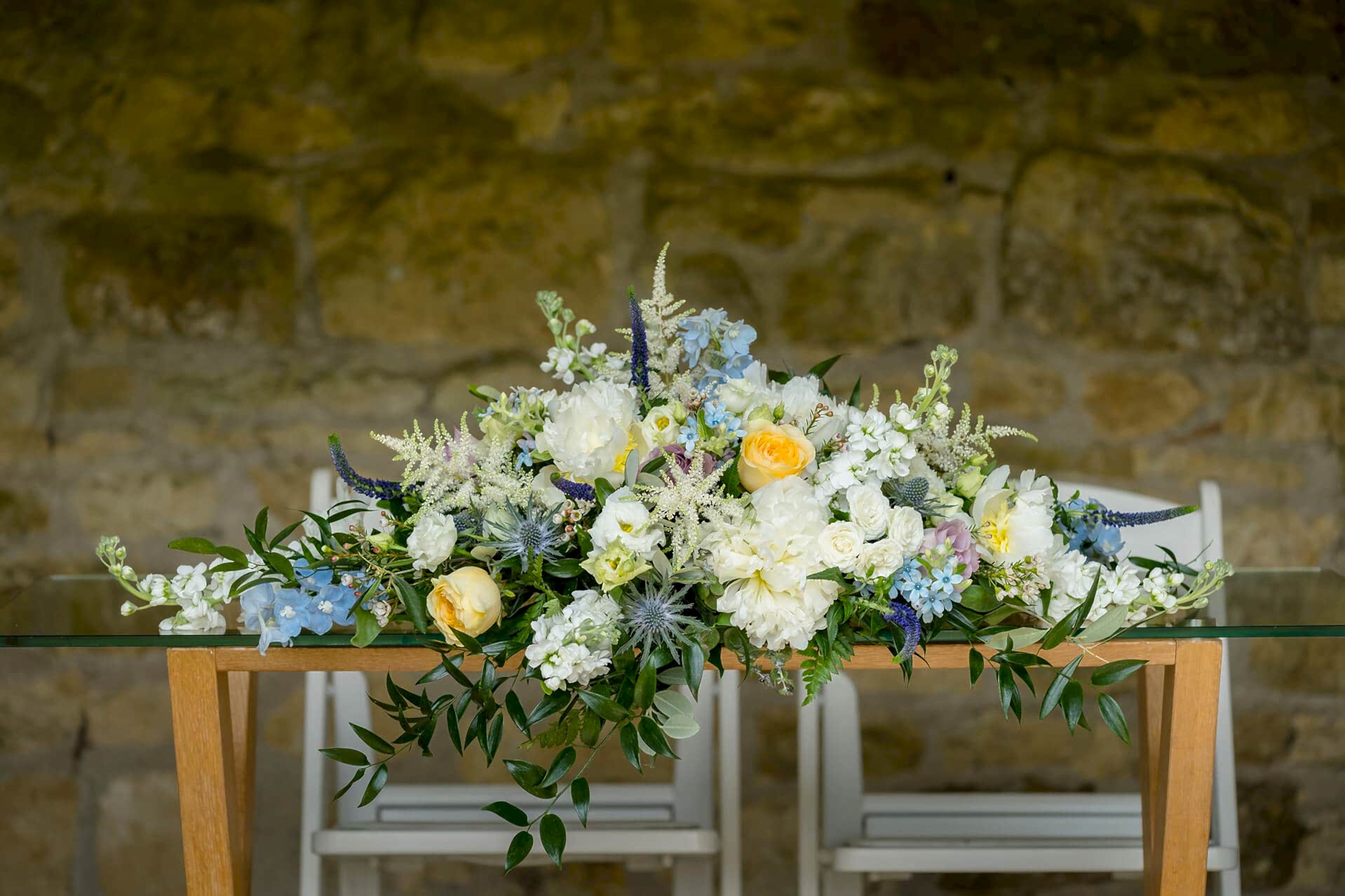 Fresh flowers on the celebrant's table