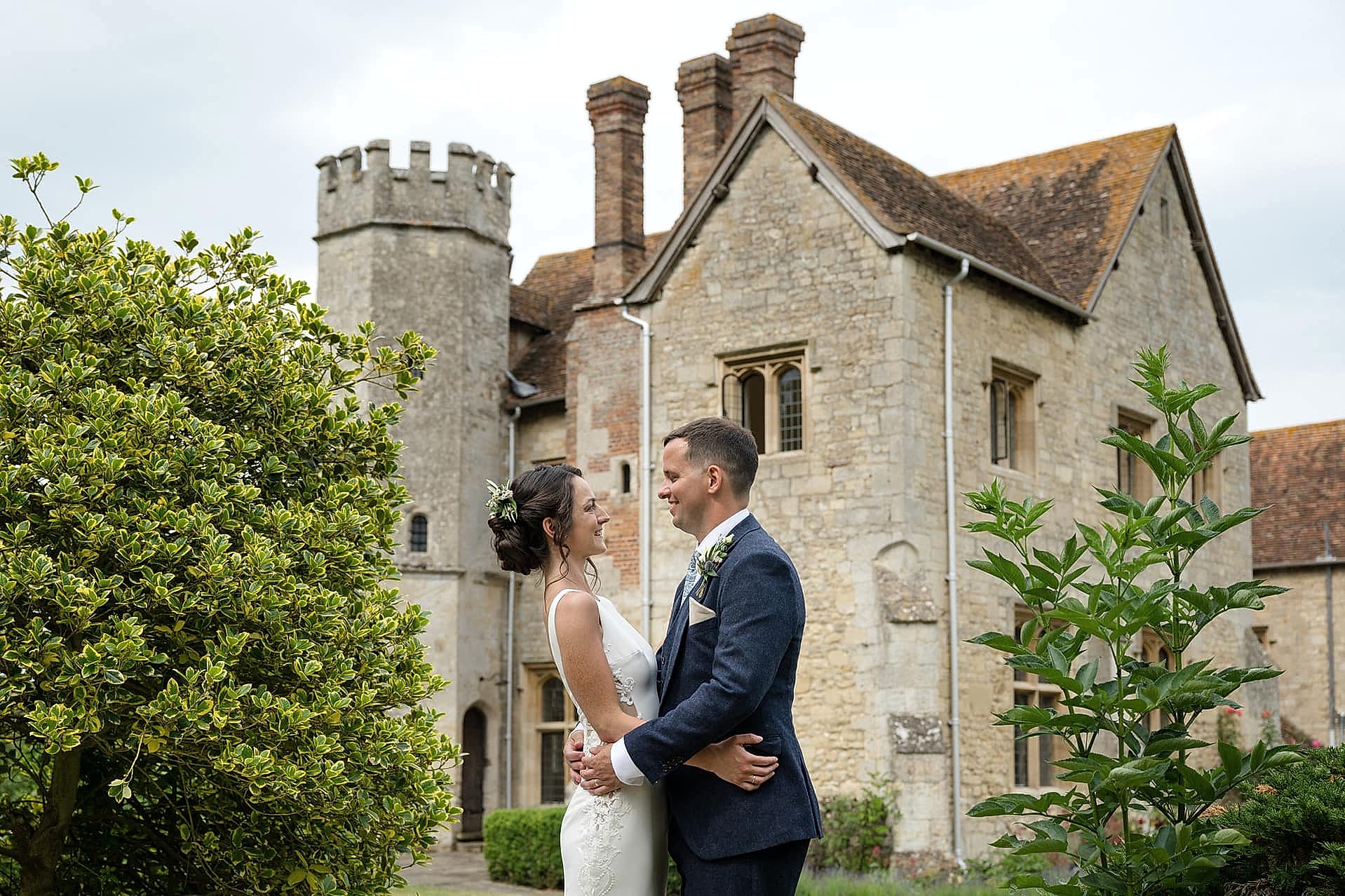 The bride and groom outside Notley Abbey