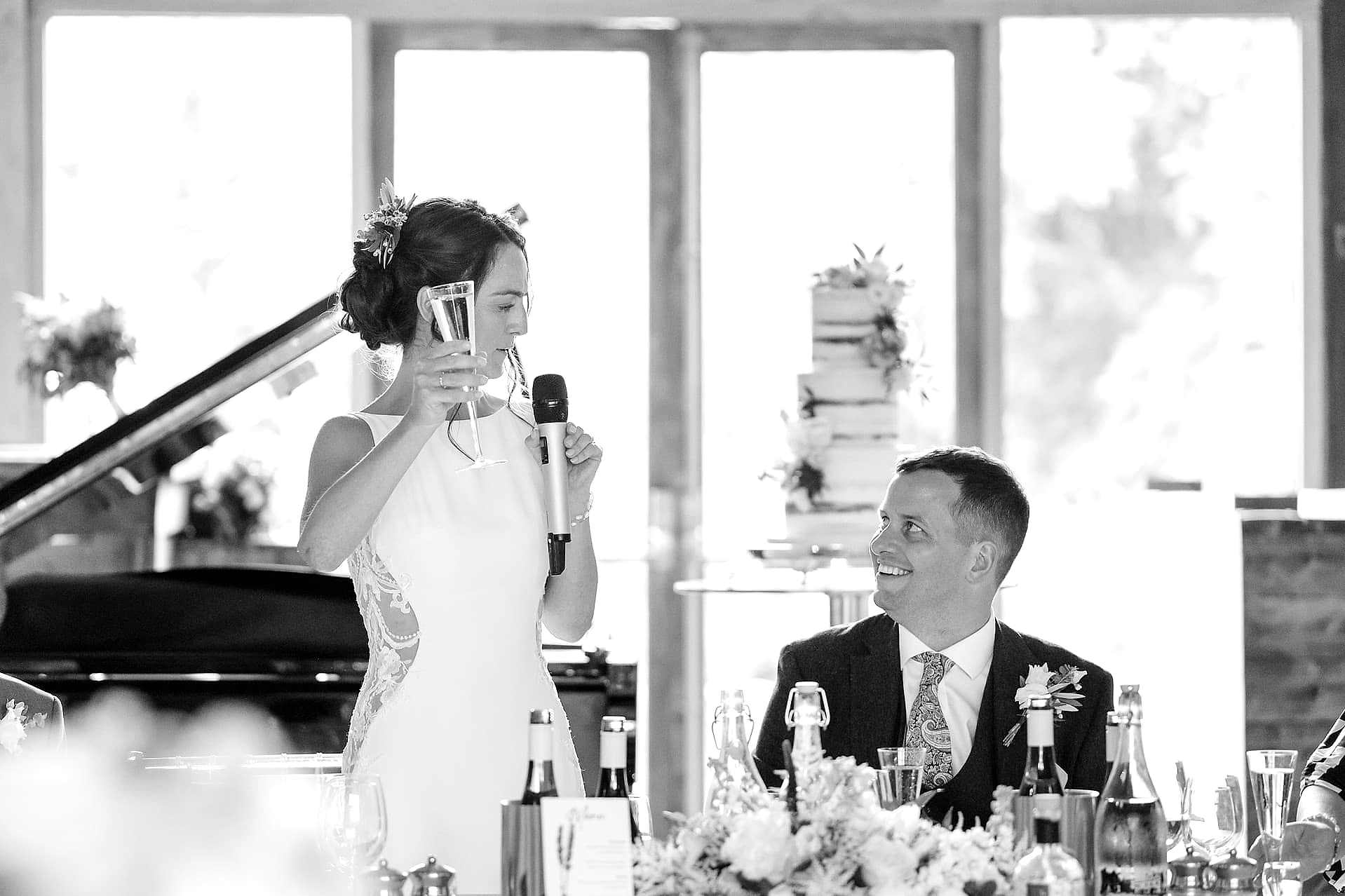 The bride toasting the groom in her speech