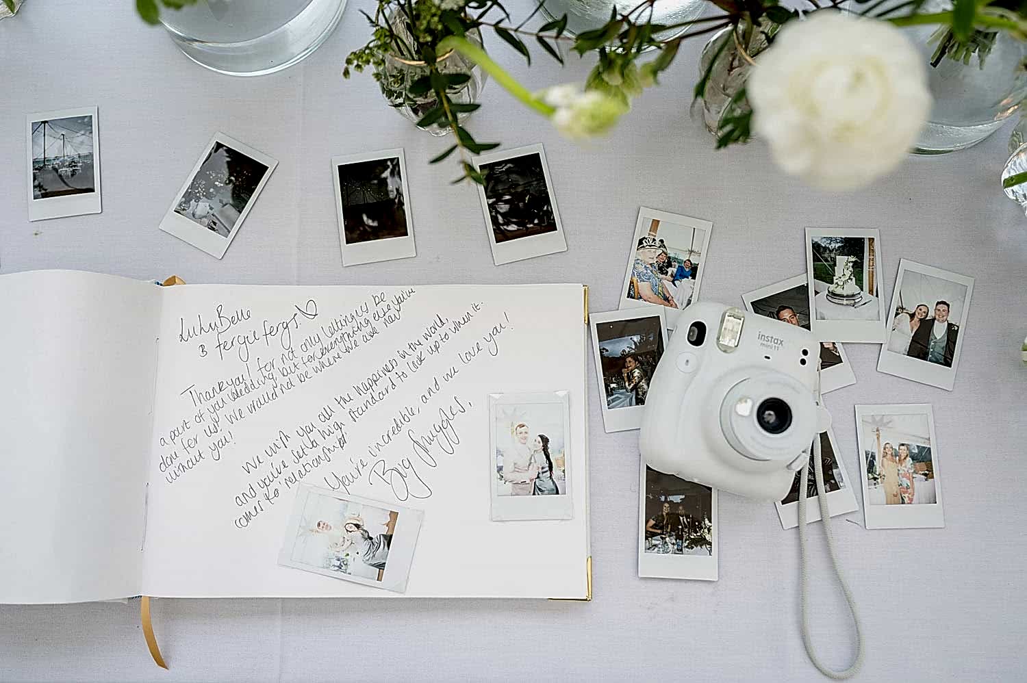 Wedding guest book with Insta camera photos