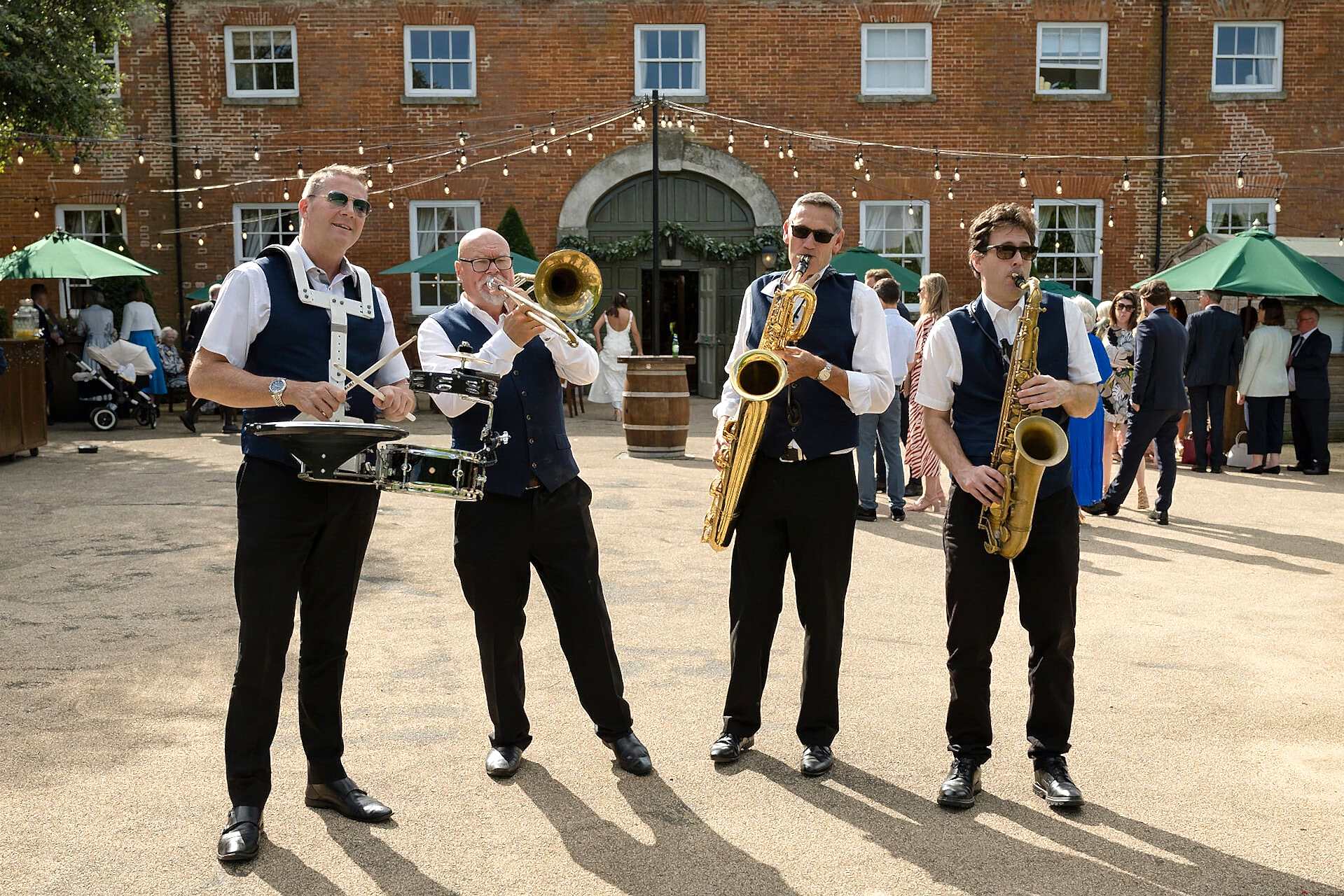 Roaming brass band in front of Knightley Court