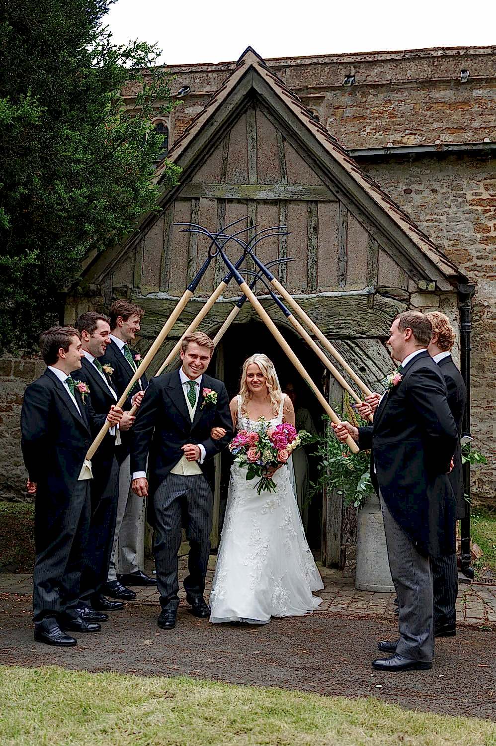 Pitchfork guard of honour at Marston Trussell church